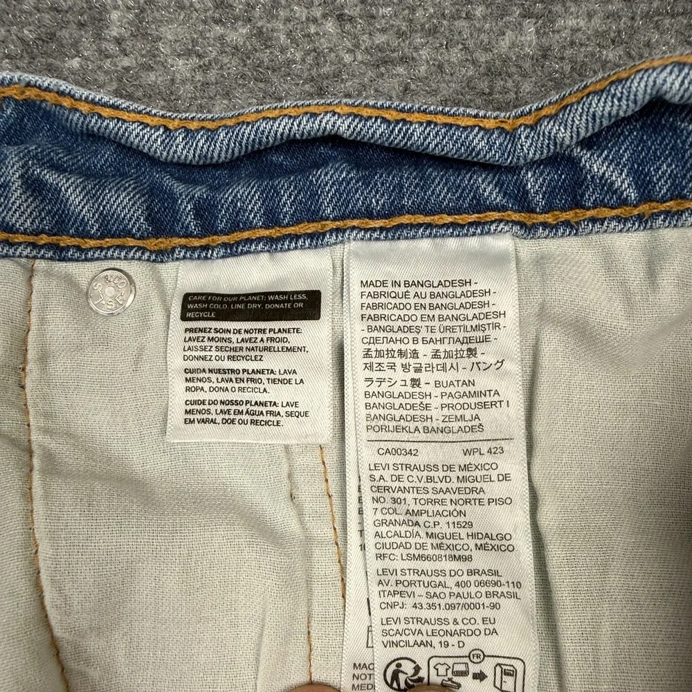Levi's 550 Relaxed Fit Jeans Men's W50 L30 Light Wash Blue Tapered Stretch Denim